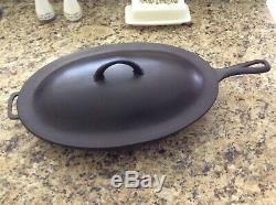GRISWOLD. OVAL SKILLET. 15. With matching lid No. 1013