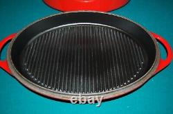 LE CREUSET ENAMELED CAST IRON OVAL RED/ORANGE DUTCH OVEN With REVERSIBLE GRILL LID