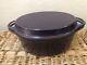 Le Creuset Cast Iron Oval Oven with Reversible Grill Pan Lid, 4 3/4 quart Purple