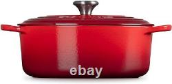 Le Creuset Enameled Cast Iron Signature Oval Dutch Oven, 5 qt, Cerise