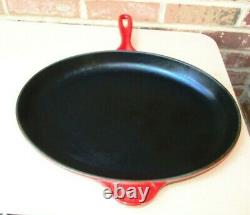 Le Creuset Signature Cast Iron 15.75 Cherry Red Iron Handle Oval Skillet
