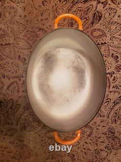 Le Creuset Signature Cast Iron 6.75 Quart Oval Dutch Oven, Flame