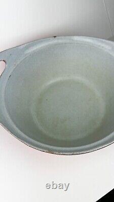 MCM Enamelwear pot Cast Iron, shows age, chips, wear in high stress areas