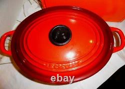 NEW LE CREUSET ENAMELED CAST IRON CERISE RED OVAL DUTCH OVEN withLID #29, 5QT TAG