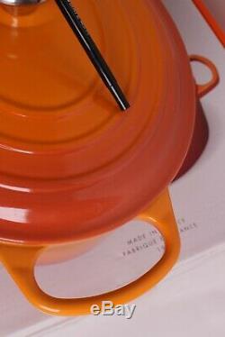 NIB Le Creuset Signature Cast-Iron Oval Dutch Oven, 6 3/4-Qt, Persimmon orange