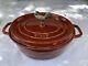 STAUB La Cocotte Oval Dutch Oven Grenadine Red Enameled Cast Iron 12.25 Rooster