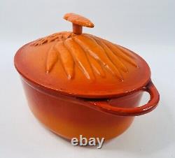 Technique Orange Enameled Cast Iron Oval Dutch Oven withCarrots Relief Lid 11 1/2